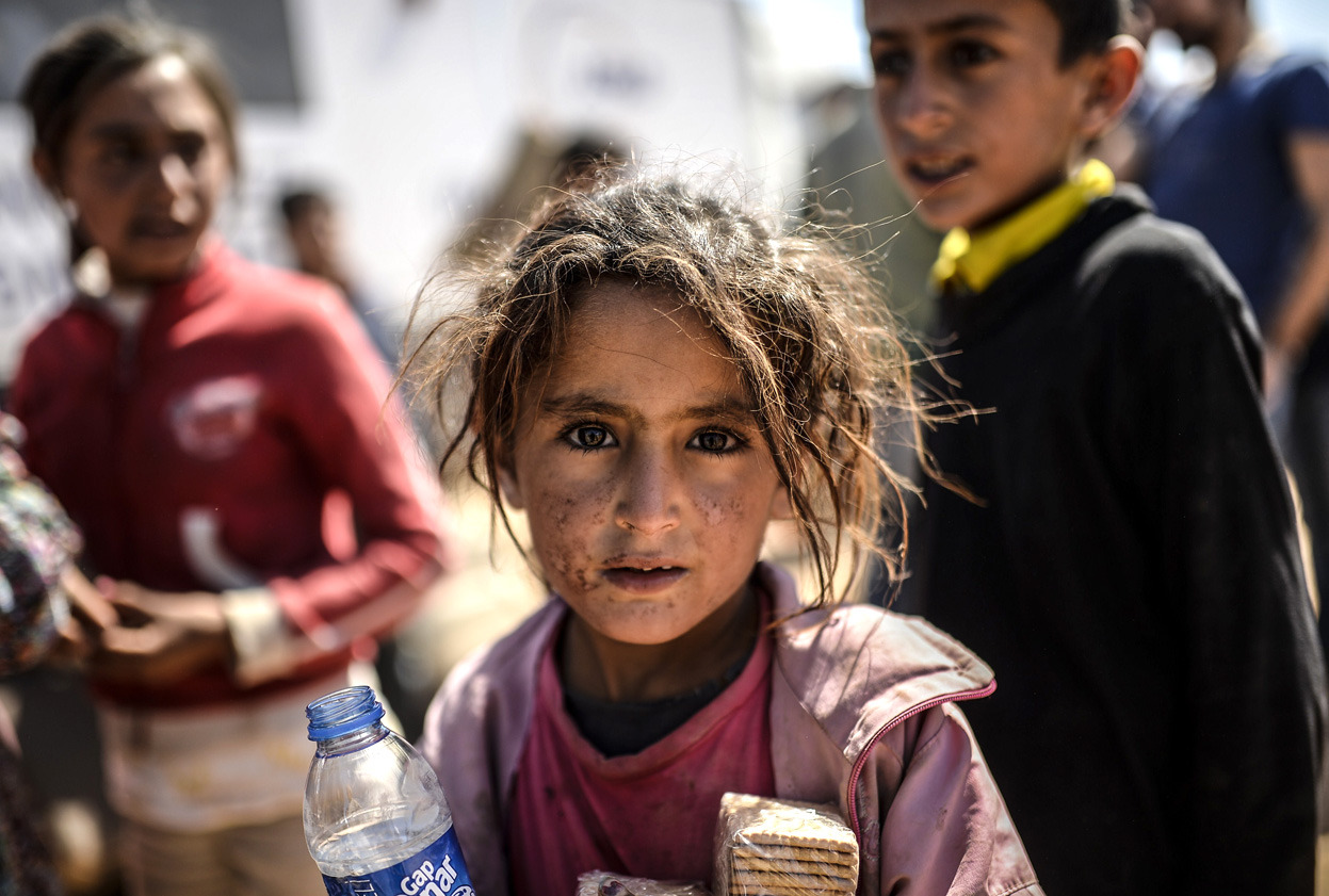 From Fleeing ISIS, Syrian Kurds Swarm into Turkey, one of 28 photos. Syrian Kurds cross the border from Syria into Turkey at the southeastern town of Suruc in Sanliurfa province, on September 23, 2014. UNHCR, the United Nations refugee agency, warned...