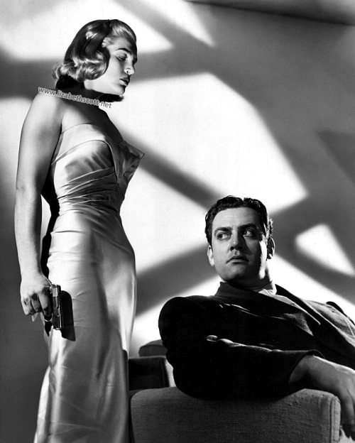 Lizabeth Scott with Raymond Burr in a publicity still for Pitfall, 1948