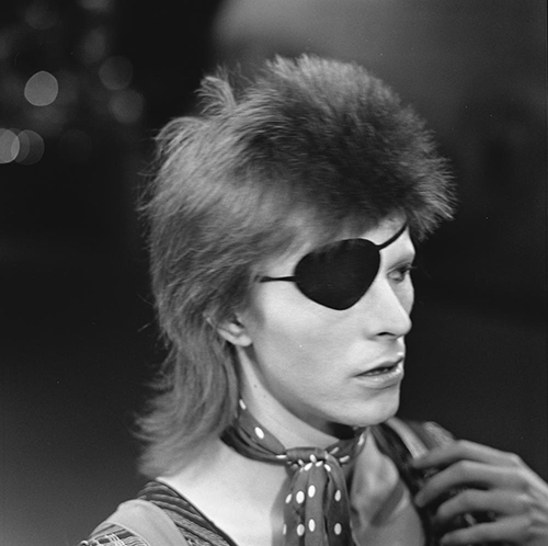 guerrillaoperator:  David Bowie shooting the video for “Rebel Rebel” on TopPop, ‘74. 