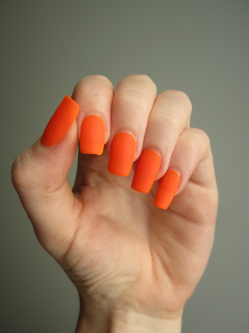 Matte orange. This is Jordana Orange Drama with a matte topcoat. More nails.