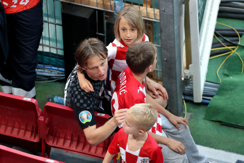 Luka Modric with his children after the match vs. Spain