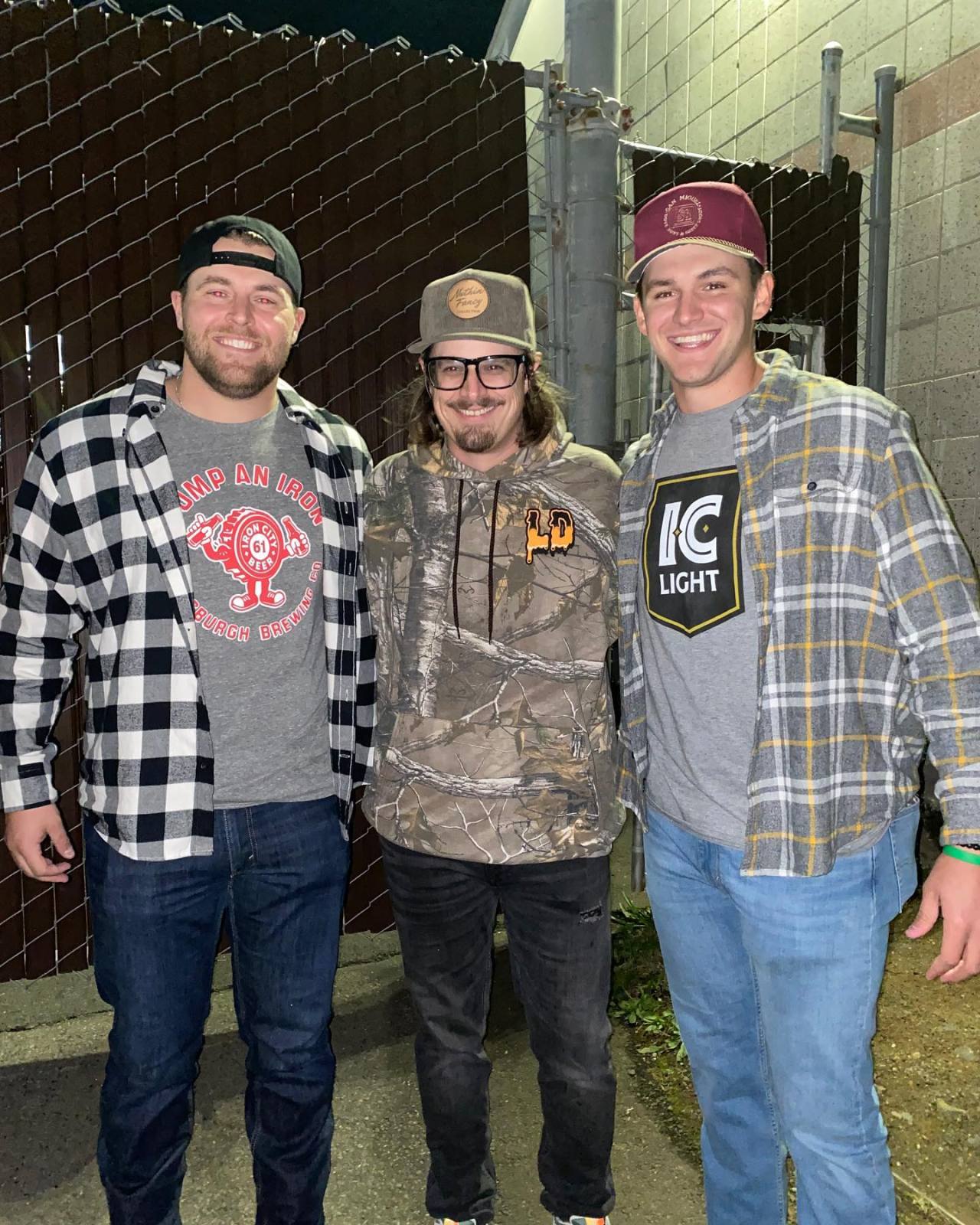 Baseball Player in Plaid Shirt.