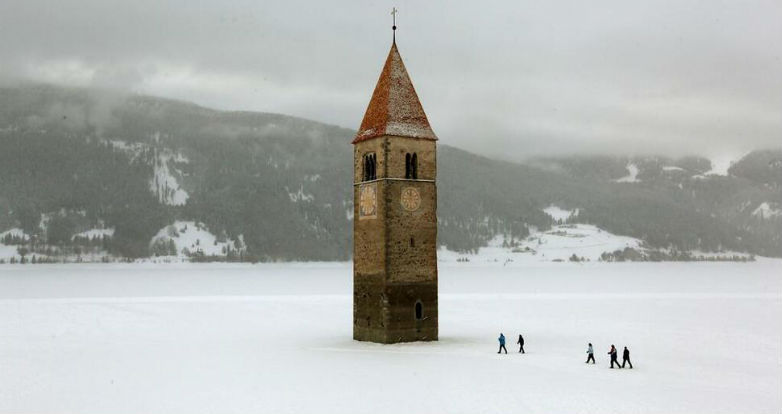 ultrafacts:The lake is famous for the steeple of a submerged church; when the water