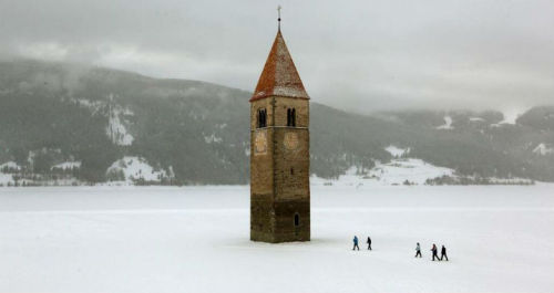 ultrafacts:The lake is famous for the steeple of a submerged church; when the water freezes, this ca