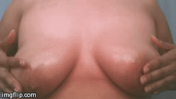 reddlr-gonewildcurvy:  Oiled tits in action!