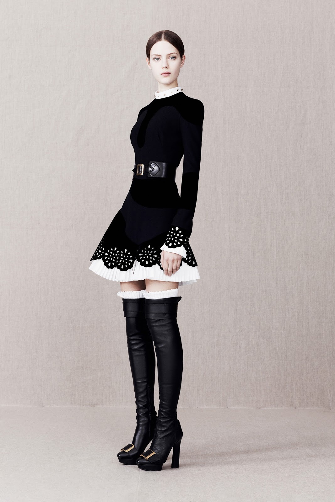 gothiccharmschool:  The black &amp; white coat! Lots of interesting, pretty designs