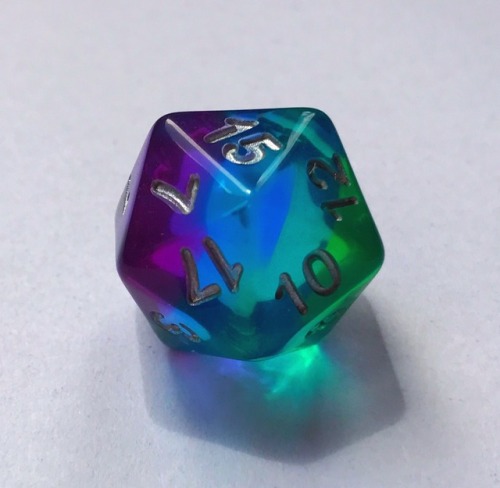 battlecrazed-axe-mage:Love this blue aurora set 💜💙💚They’re from a Chinese company called HDDice that’s really been putting out some interesting dice recently! To me they look like rainbow fluorite.