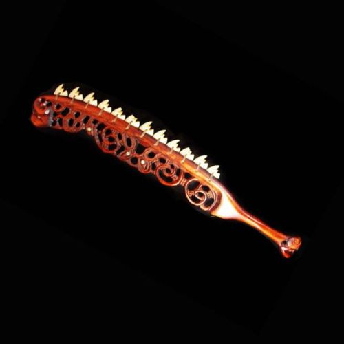 treasures-and-beauty: Hawaiian war club. The weapon resembles a thick sword or club  with shark teet