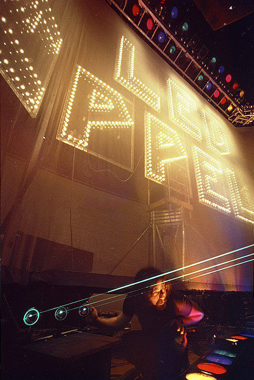 beatnikdaddio:  led zeppelin roadie doing a lighting check. 1975.