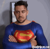 hotudla:“Whenever you hear the word ‘SuperCockSucker’ all your powers will fade away”. 🍆💪🏻💥Evil Michael Delray is in his office plotting evil stuff. He has a huge rock hard boner, bulging through his red spandex pants. Superman (Dante