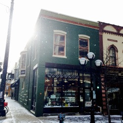 literatibookstore:  Snow falling on a bookstore.