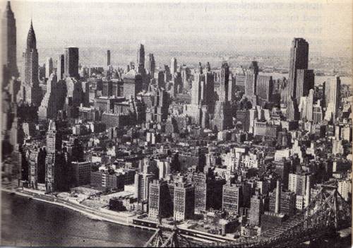 Aerial view looking southwest of Midtown Manhattan in the summer of 1947. The Empire State and Chrys