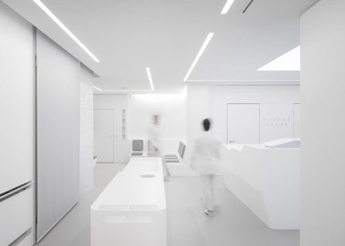 dezeen:  Almost everything is pristinely white inside this dental clinic in Sicily by architecture studio Bureauhub, from the walls and floors to furniture, equipment and staff uniforms