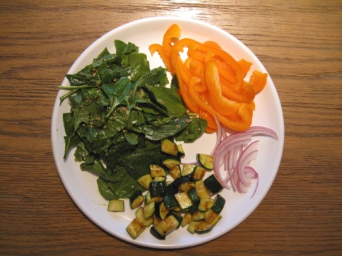Baby spinach and green oil salad with onion powder, balsamic vinegar, and olive oil&frac12; orange b