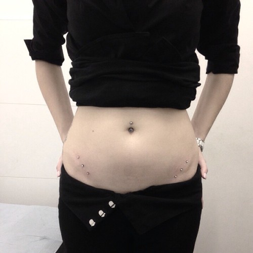 6 hip dermals all done in one sitting by our piercer Kwan #ukpiercer #piercings #londonpiercer #derm