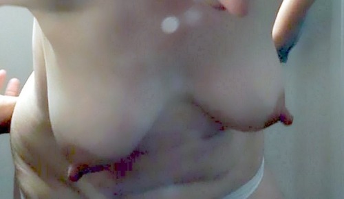 wifeysaggytitshow:  Little udders ready to be milked.She loves them to be sucked.  Nice, let me help you with that!