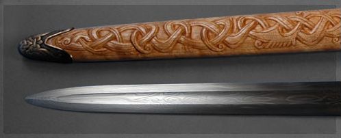art-of-swords:Handmade Swords - Vardhllokur (Spirit Song)Maker: Jake PowningMedium: steel, oak, bitc