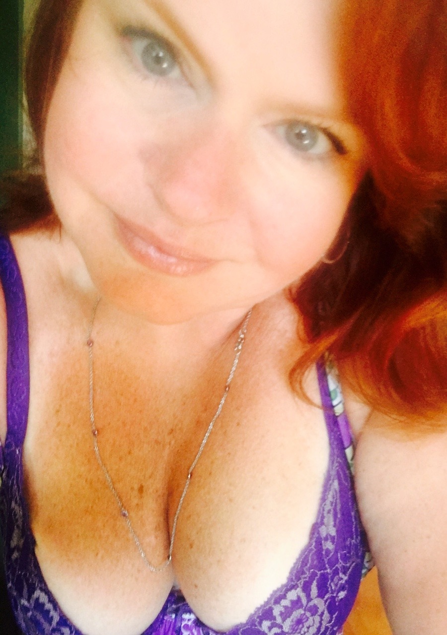 prettylilredhead:  My  purple bra makes an appearance for cleavage Sunday again…lol