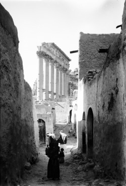 poetryconcrete:The village inside the temple of Bel, early 20th century, in Palmyra, Syria.