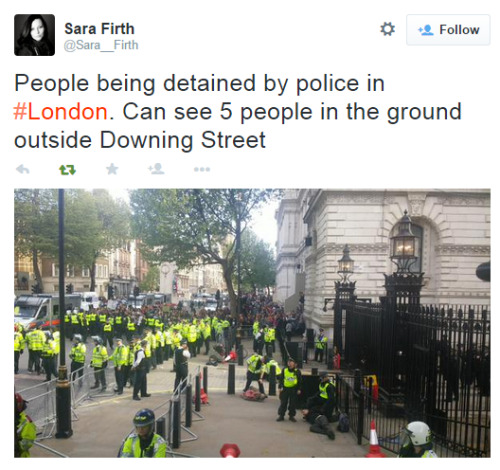 hellotailor:Anti-austerity protest today, just outside Downing Street.Here’s a recent video from the