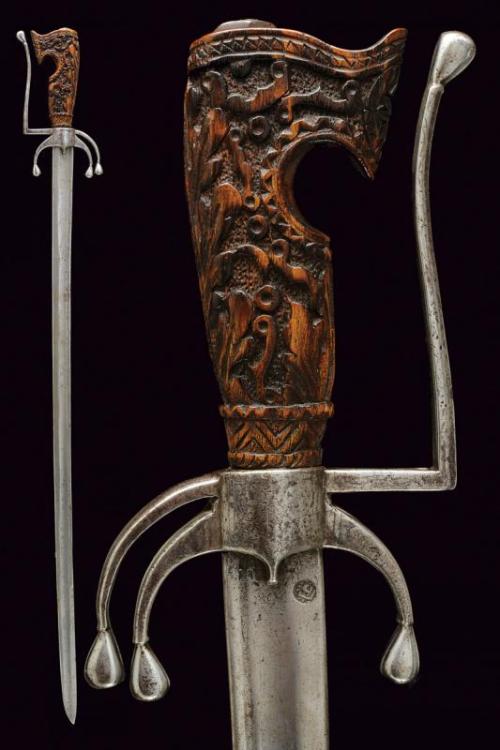 Moroccan nimcha with carved wooden grip, 19th century.from Czerny’s International Auction House