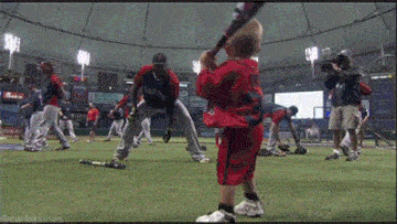 awesome-pics-blog:  A young boy hits a pitch tossed by Boston Red Sox DH David Ortiz and hits him in his groin. 