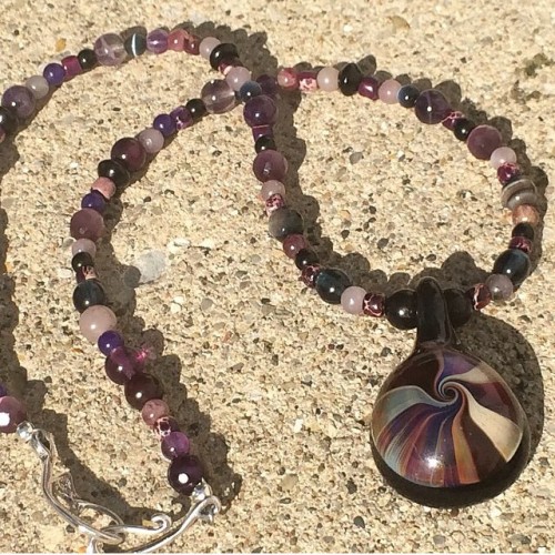 Loving this unique necklace by @redcloverjewelry ~ the beads perfectly compliment our spiral pendant