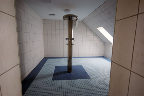 Male shower room in a dorm at Sportpark Rabenberg, Germany. This dorm primarily serves school and sc