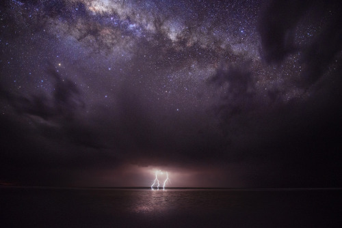 just–space:  Lightning and the galaxy, Julie Fletcher js