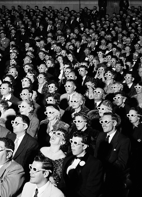 vintagegal:  Formally attired audience sporting 3-D glasses during opening night