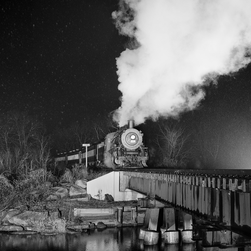 A steam train approaches Deep River Creek near Essex, CT. I just posted this canvas print and a few others for sale.
I was nervous about shooting in the rain - but it turned out great. The exhaust hung forever in the cold, damp air.