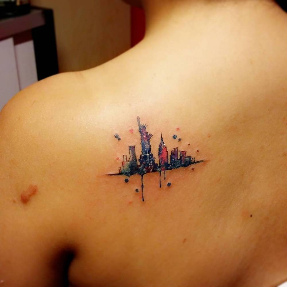 My firsts tattoo What New York City Skyline with a splash of color When  092615 Where NYC Ink  Small tattoos Skyline tattoo Tattoos