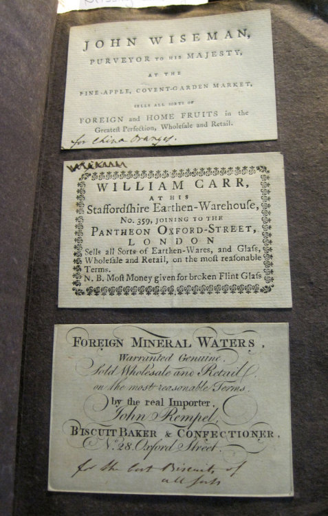 The pages above are from a collection of advertising cards, advertisement clippings, and instruction