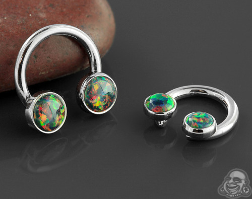 bodyartforms:  Titanium septum ring with bezel set opal cabochon ends by anatometal www.bodya