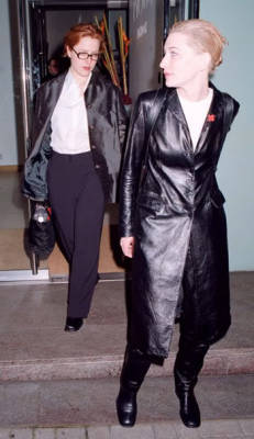 foxmulders:  epistemologicalfallacy:  tinyfbiagent:  gillian + cate  this is perhaps the gayest photoset i have ever seen send this to the archives  they look like a couple of bootleg matrix cosplayers