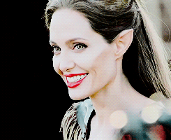 oswinwaled-archive:  Angelina Jolie being extremely cute on the set of Maleficent 