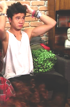 tomlinsonhun:  Calum fixing his hair is literally the most important thing right