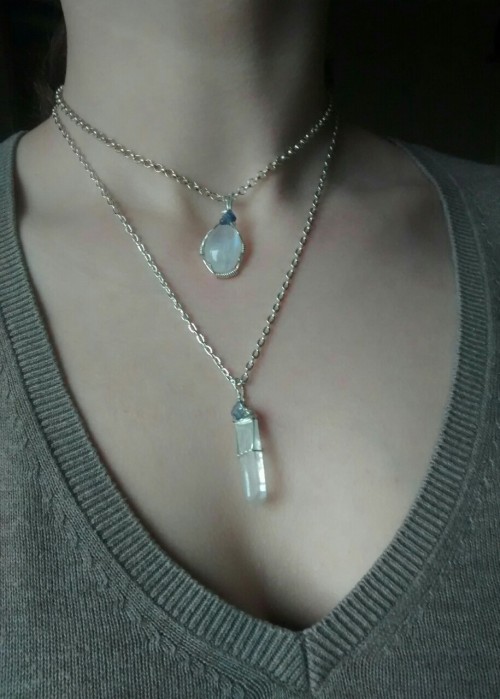 90377: wearing my two selfmade pendants today. rainbow moonstone and clear quartz point with tanzani