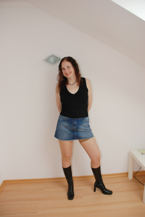 lustfulmuse: Photography while wearing a jeans mini, tight stockings and black boots. Why not enjoyi