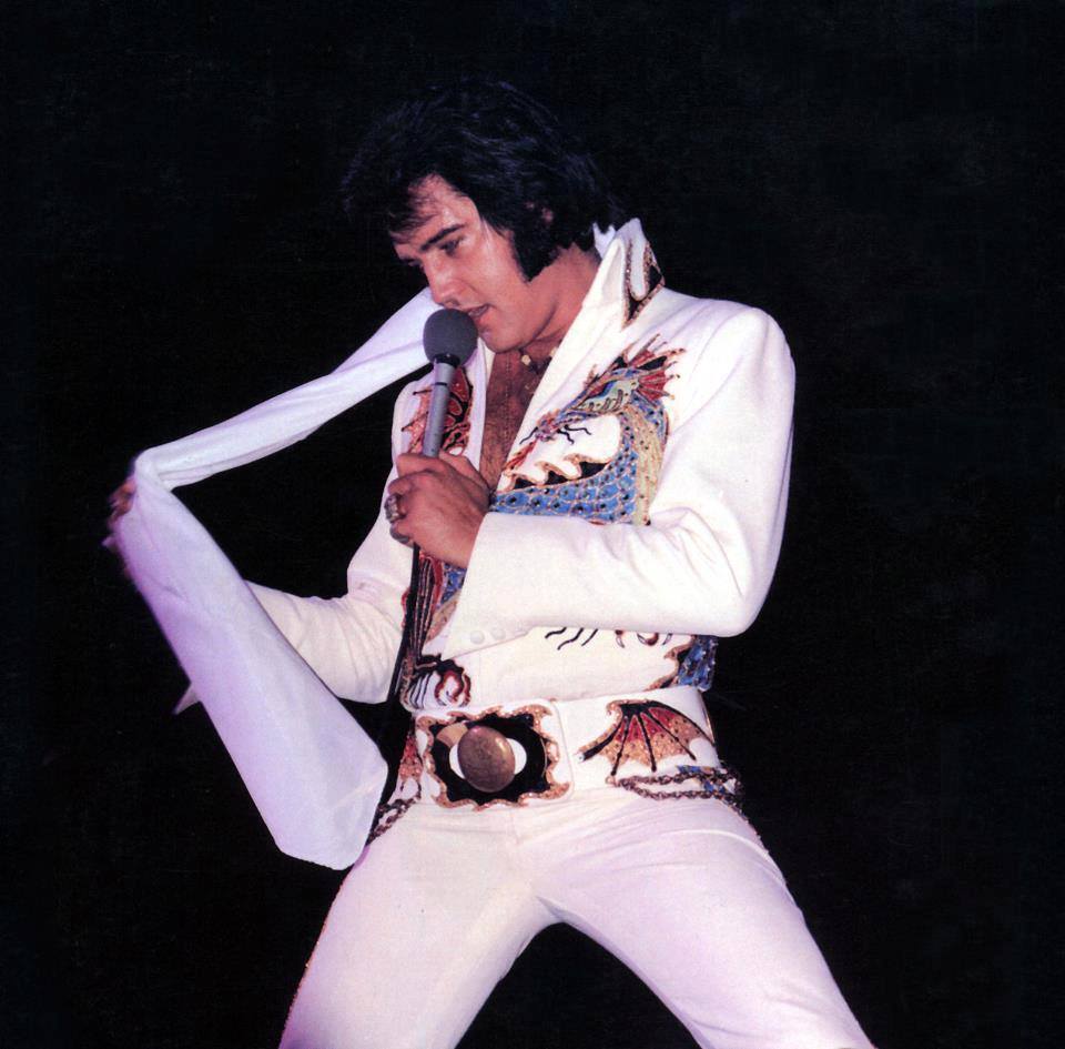 elvisanddenise:  taking a scarf off to give away 