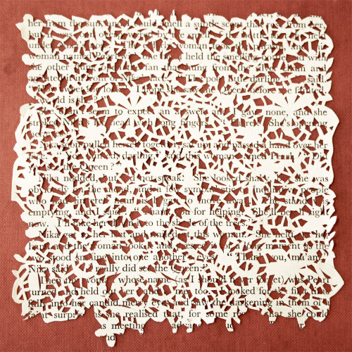 Hand cut paper lace
