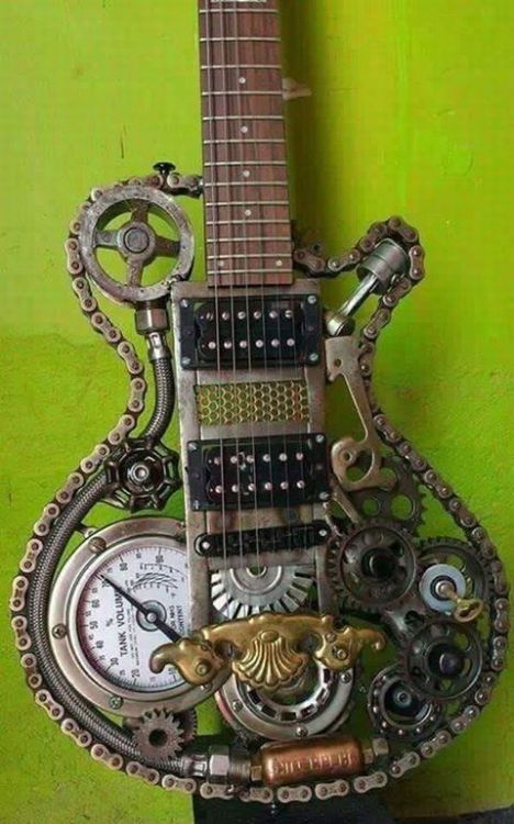 Playable scrap metal guitar by Oscar González.Steampunk Tendencies [ Twitter | Instagram | Facebook 