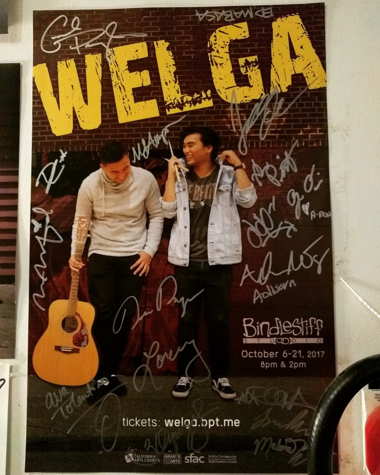 Pictured: A photo of my play's cast and crew autographed poster for WELGA which is currently posted inside the Bindlestiff Studio's Green Room.