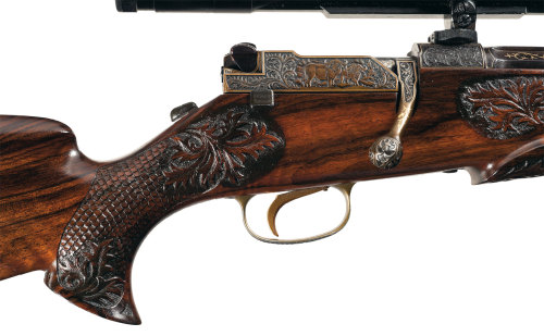 Magnificent engraved, gold inlaid Mauser Model 66S bolt action sporting rifle with carved stock.  Bu