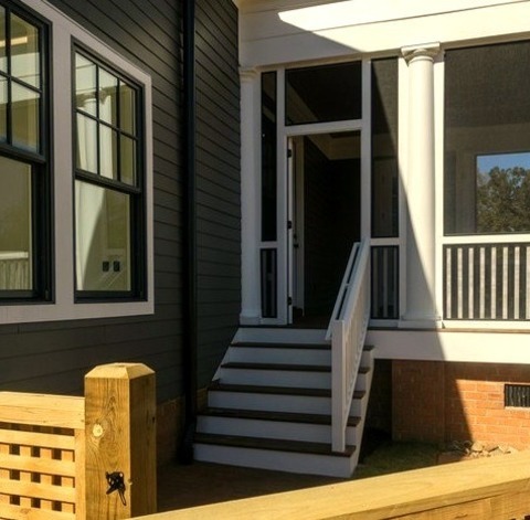 Fiberboard - ExteriorExample Of A Large Classic Gray Three-story Concrete Fiberboard House Exterior Design