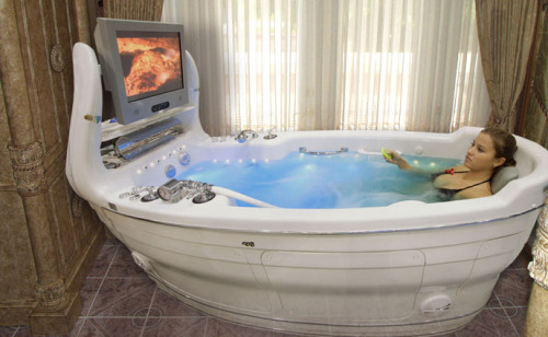 cloudfreed: humancomputer:  If you need me I’ll be in the bath watching lava on my television  “sigh…. this extremely hot water will have to do” 