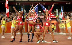 thenerdsaurus:  American athletes Francena McCorory, Sanya Richards-Ross, Natasha Hastings and Felix, Beijing 2015 at Beijing National Stadium. 