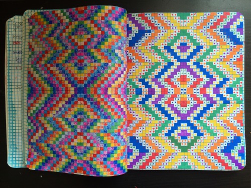 Inside my notebook are pages with small boxes Individually painted with color Left: the back bleed 
