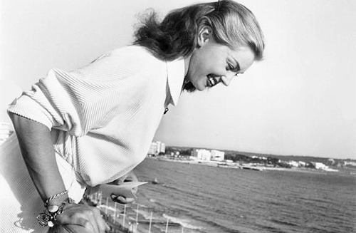 barbarastanwyck:  Esther Williams throwing autographs off a balcony to her fans below at Cannes Film Festival, 1955 