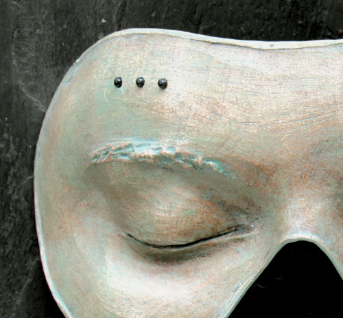 DREAM MASK (ELLIPSIS)Connemara slate, unglazed stoneware, lampworked glass, pigment wash, wax5¾&quot